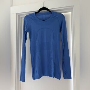 Swiftly tech long sleeve hip length